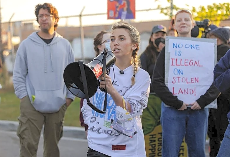 US to drop felony charge against ex-congressional candidate, three others over Chicago immigration protest