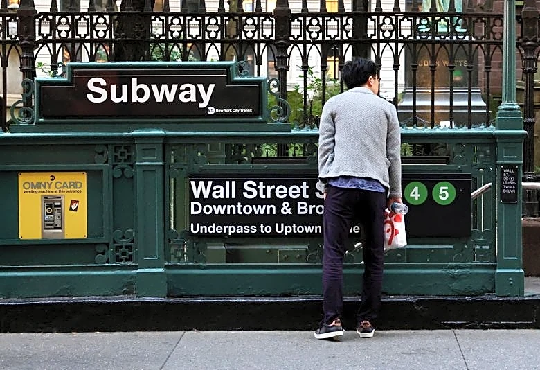 Wall Street ends mixed after Fed decision, big tech earnings on tap