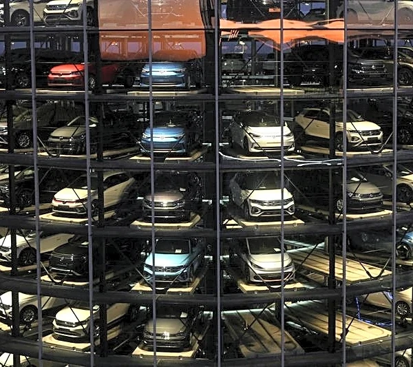 Volkswagen's first-quarter profit drop spurs further cuts