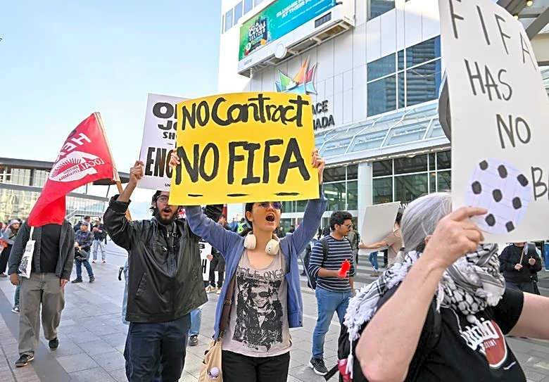 Soccer-Advocates for homeless, hotel workers rally outside FIFA Congress in Vancouver