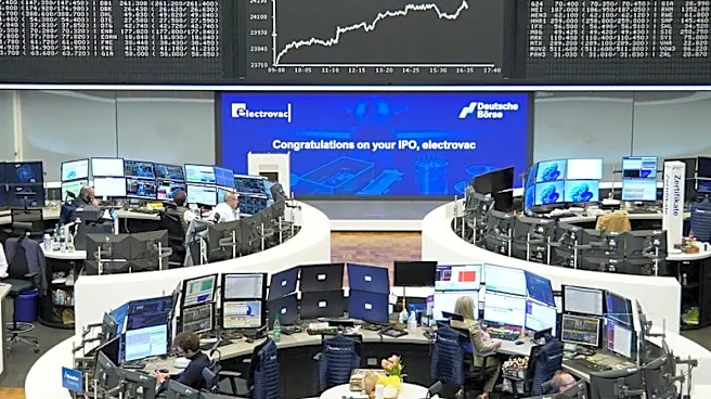 Europe shares inch lower as tariff threats drag automakers; investors assess Mideast progress