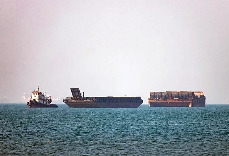 Middle East truce in doubt as US and Iran fight for control of Strait of Hormuz