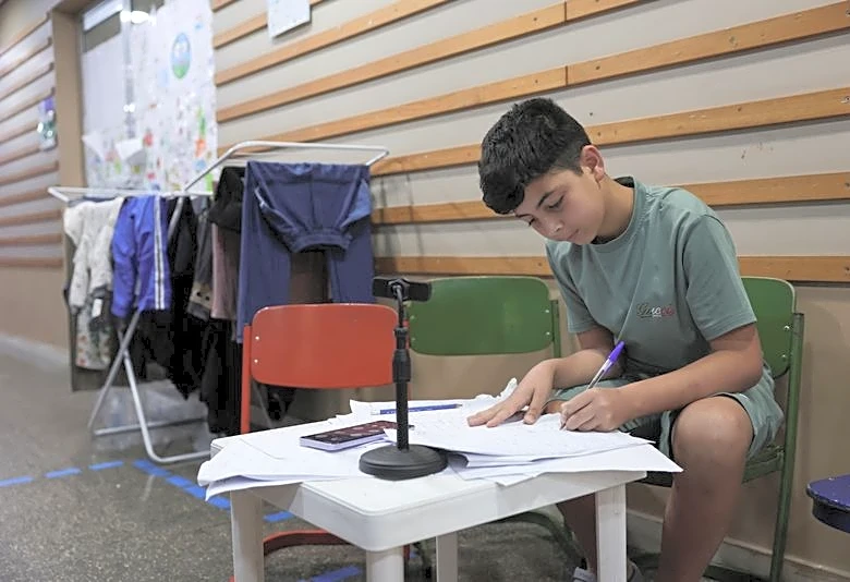 Beirut school converted to wartime shelter becomes flashpoint for societal tensions