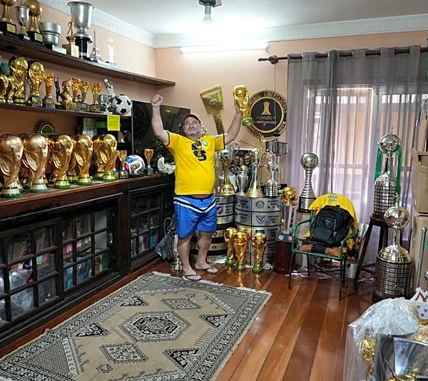 In Rio, artisan crafts World Cup trophies while hoping Brazil gets a real one