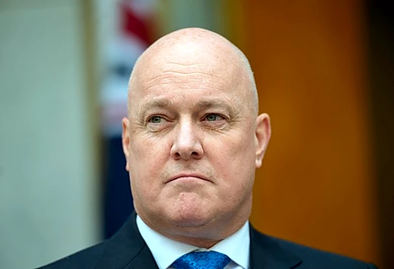NZ trims new spending, sticks to surplus path as global risks heighten