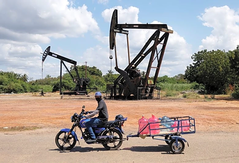 Venezuela starts sovereign, PDVSA debt overhaul; liabilities seen above $150 billion
