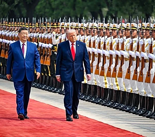 Trump and Xi set for second day of talks after Taiwan warning