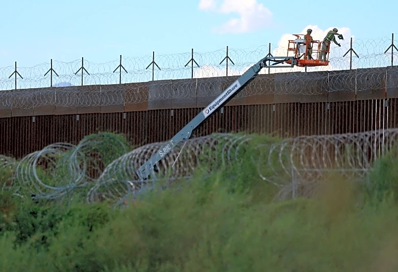 US judge blocks key parts of Texas migrant arrest law