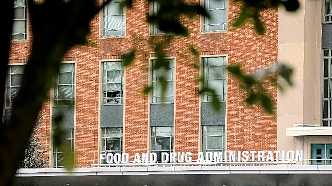 FDA drug center head fired after commissioner's exit, replaced by Davis
