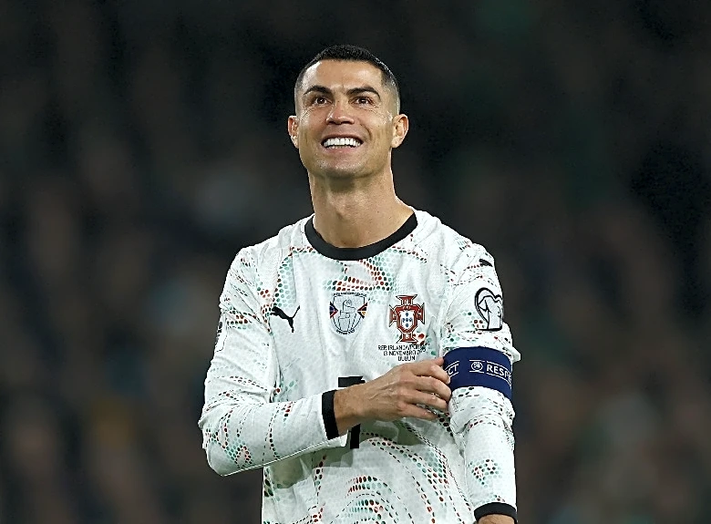 Soccer-Ronaldo to lead Portugal at sixth World Cup as Martinez names 27-man squad
