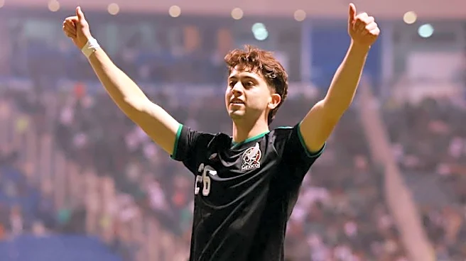 Soccer-Mexico ease past Ghana in World Cup warm-up in Puebla