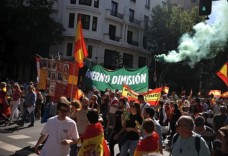 Tens of thousands march in Madrid to demand prime minister's resignation