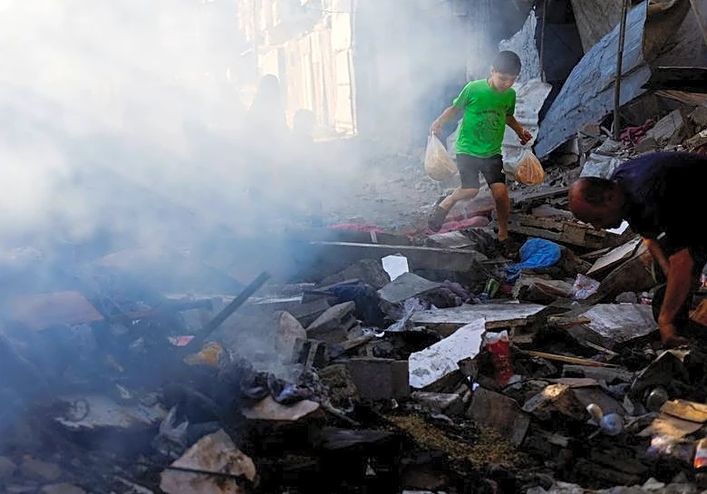 Israeli fire kills parents and their infant in Gaza, medics say