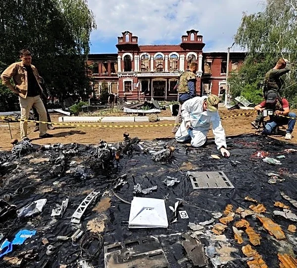 Forensic experts sift through ruined dormitory in Russian-held Luhansk region