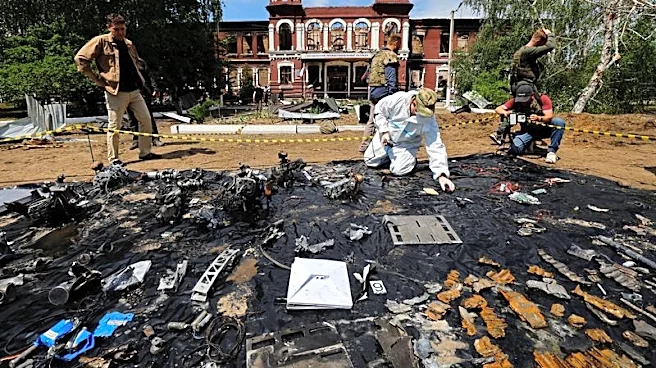 Forensic experts sift through ruined dormitory in Russian-held Luhansk region