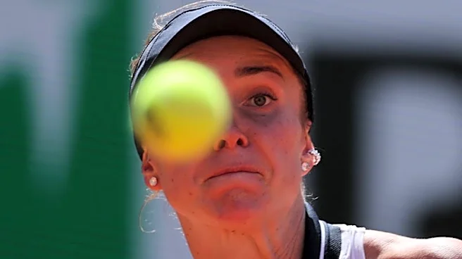 Tennis-Svitolina huffs and puffs into French Open round two