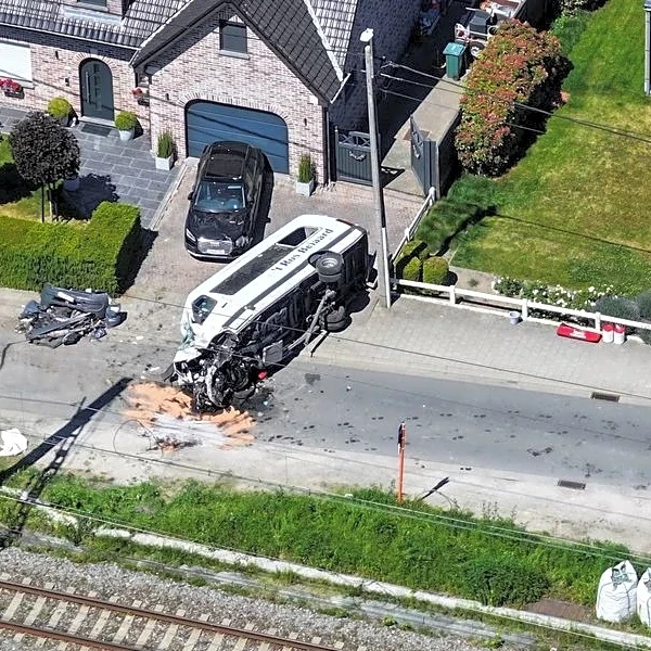 Train hits school minivan in Belgium, killing four including pupils