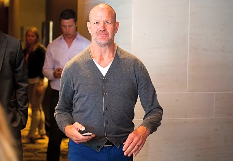 Exclusive-Lululemon nears deal to settle proxy war with founder Chip Wilson