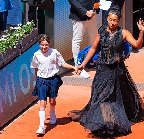 Tennis-Osaka embracing role as entertainer after another grand walk-on