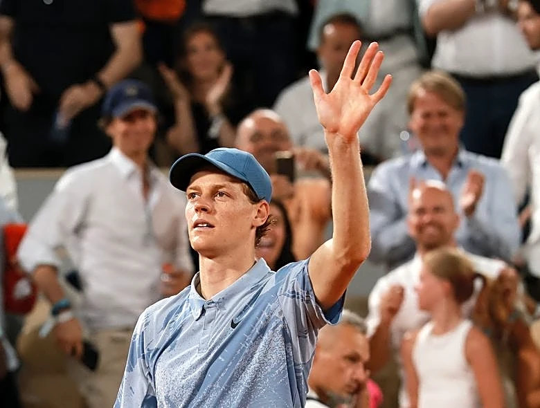 Tennis-Sinner eases into French Open second round