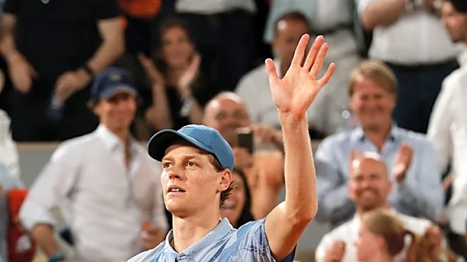 Tennis-Sinner eases into French Open second round