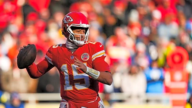 Patrick Mahomes, in knee brace, participates in Chiefs' first practice