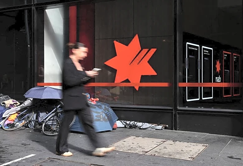 Analysis-Once investor darlings, Australian banks get reality check on mortgage change