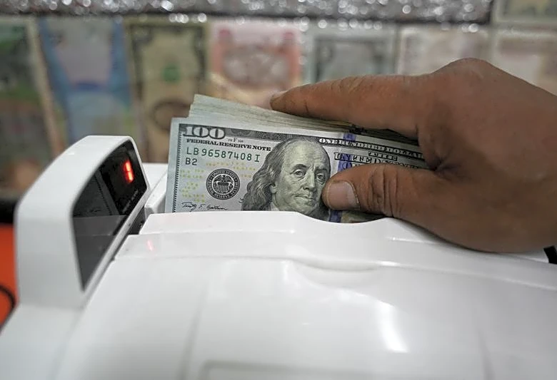 Dollar set to weaken long-term, Europe has work to do, JPMorgan AM, Euroclear execs say
