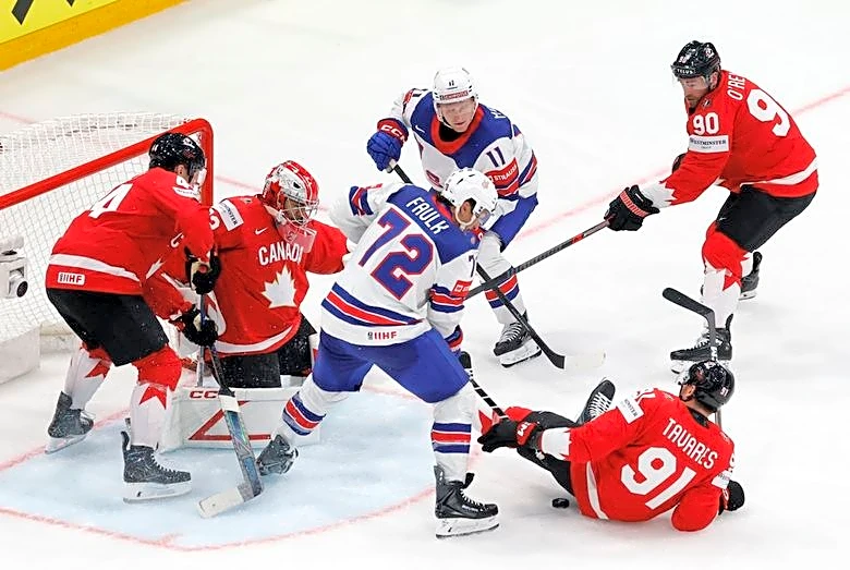 Ice hockey-Canada through to world championship semis after win over US