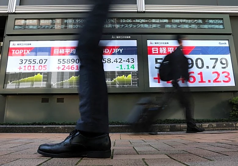 Oil eyes weekly drop on Hormuz deal hopes; AI sends stocks to record highs