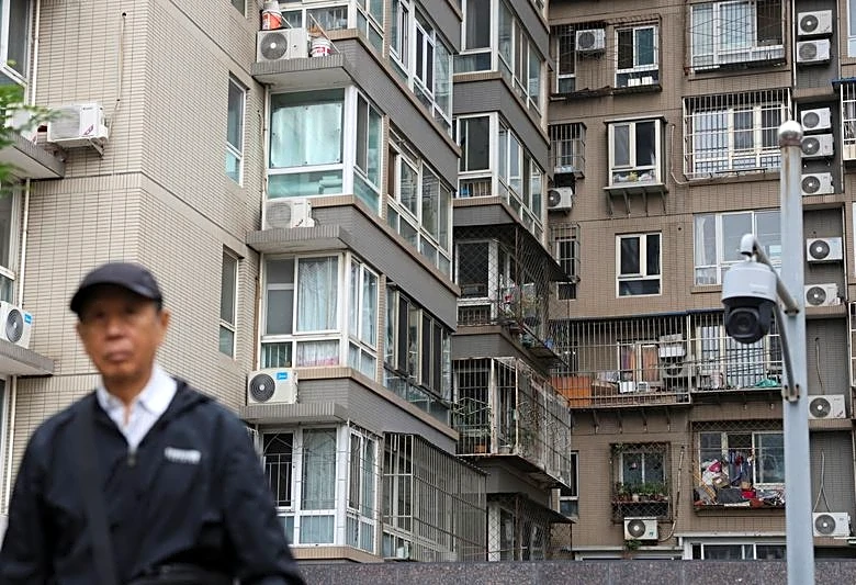 China home prices likely to fall at slower pace this year; seen rising in 2027