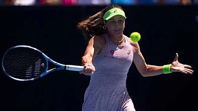 Tennis-Sonmez trips over advertisement sign, tumbles out of French Open