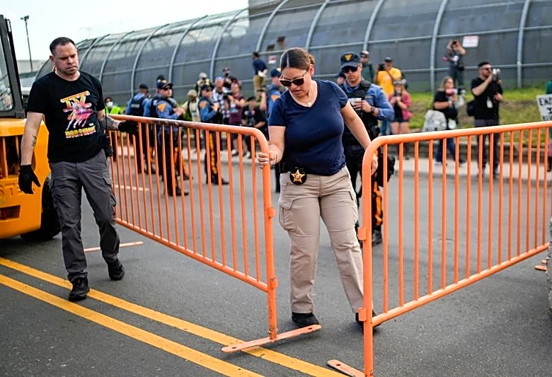 New Jersey state police assert control outside migrant detention center