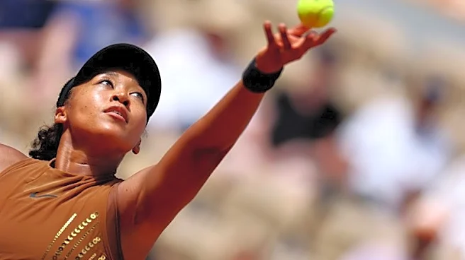 Tennis-Gold-sequined Osaka survives three-set scare against teenager Jovic