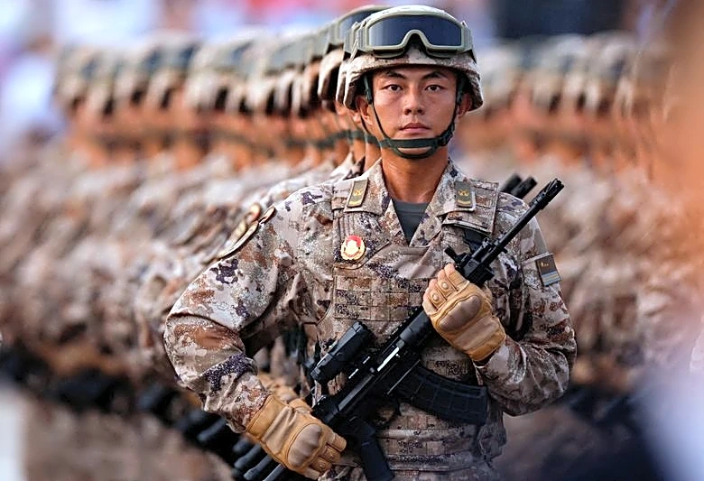 Japan refutes 'new militarism', accuses China of rapidly arming