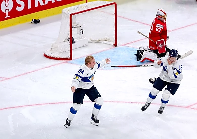 Ice hockey-Helenius is the hero as Finland beat Swiss in world final