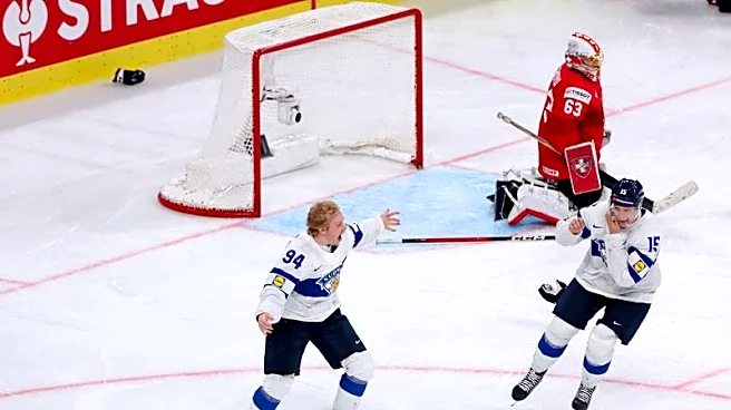 Ice hockey-Helenius is the hero as Finland beat Swiss in world final