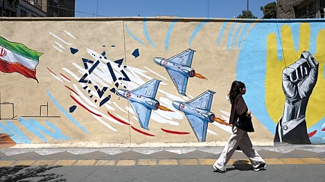 US says it struck Iranian military sites, Tehran responds with air base attack