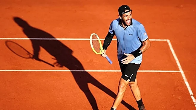 Tennis-Italian trio poised for semi-final charge at Roland Garros