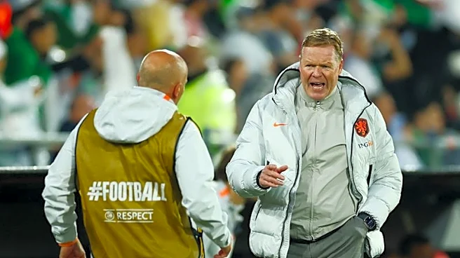 Soccer-Netherlands' loss to Algeria a pre-World Cup wake-up call, says Koeman
