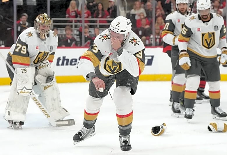 Knights' Brayden McNabb hospitalized after taking puck to face