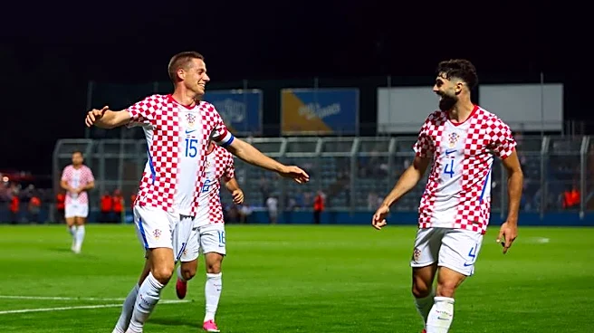 Soccer-Croatia head to World Cup on high after late 2-1 win over Slovenia