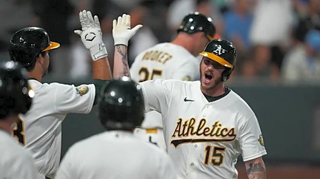 MLB roundup: Brewers outslug A's 15-14 in 12 innings at Las Vegas