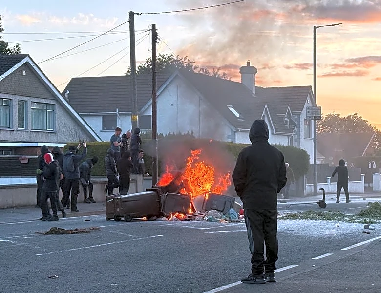 UK minister says violence in Northern Ireland is racist thuggery