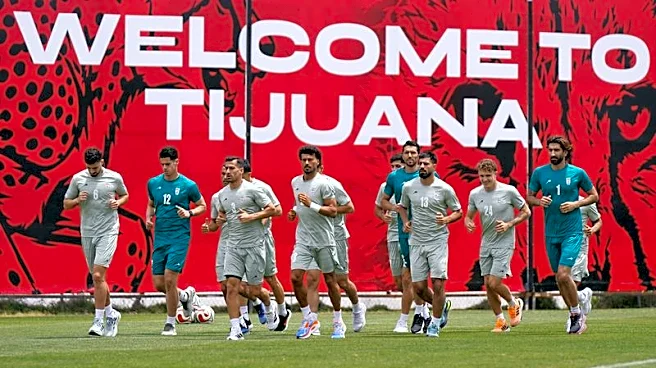 Soccer-Iran players conduct first open practice at Tijuana camp