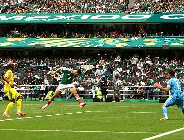 Soccer-Mexico get World Cup party started with 2-0 win over nine-man South Africa