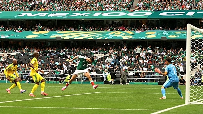 Soccer-Mexico get World Cup party started with 2-0 win over nine-man South Africa