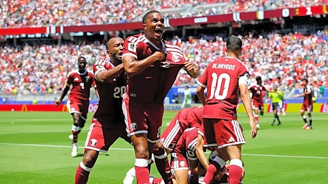 Soccer-Qatar score late to clinch draw with stunned Switzerland
