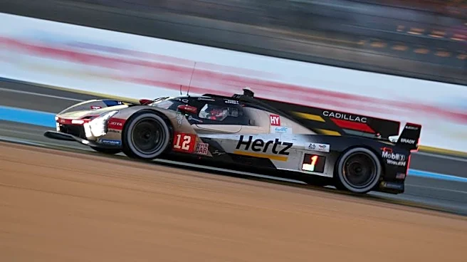 Motor racing-Cadillac and BMW in tight battle with six hours to go at Le Mans