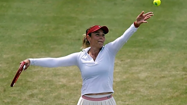 Tennis-Vekic hangs tough to beat Raducanu in Queen's final
